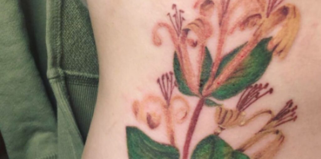 What does a honeysuckle flower tattoo mean