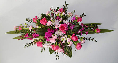What are some tips for creating stunning bouquets and centerpieces with Moses-in-the-Cradle plants