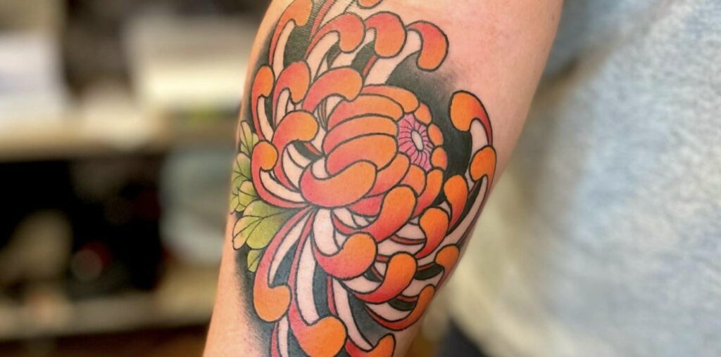 What does a chrysanthemum flower tattoo mean